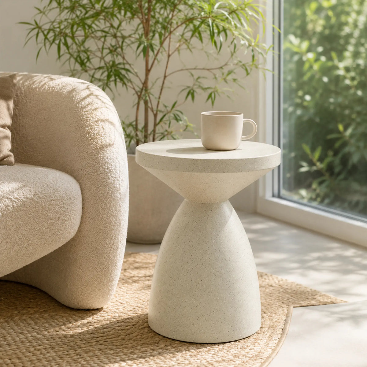 LIVARA Hourglass Round Side Table with Sculptural Pedestal Design, Durable Magnesium Cement & Speckled Finish, Modern Accent Table for Living Room - Beige