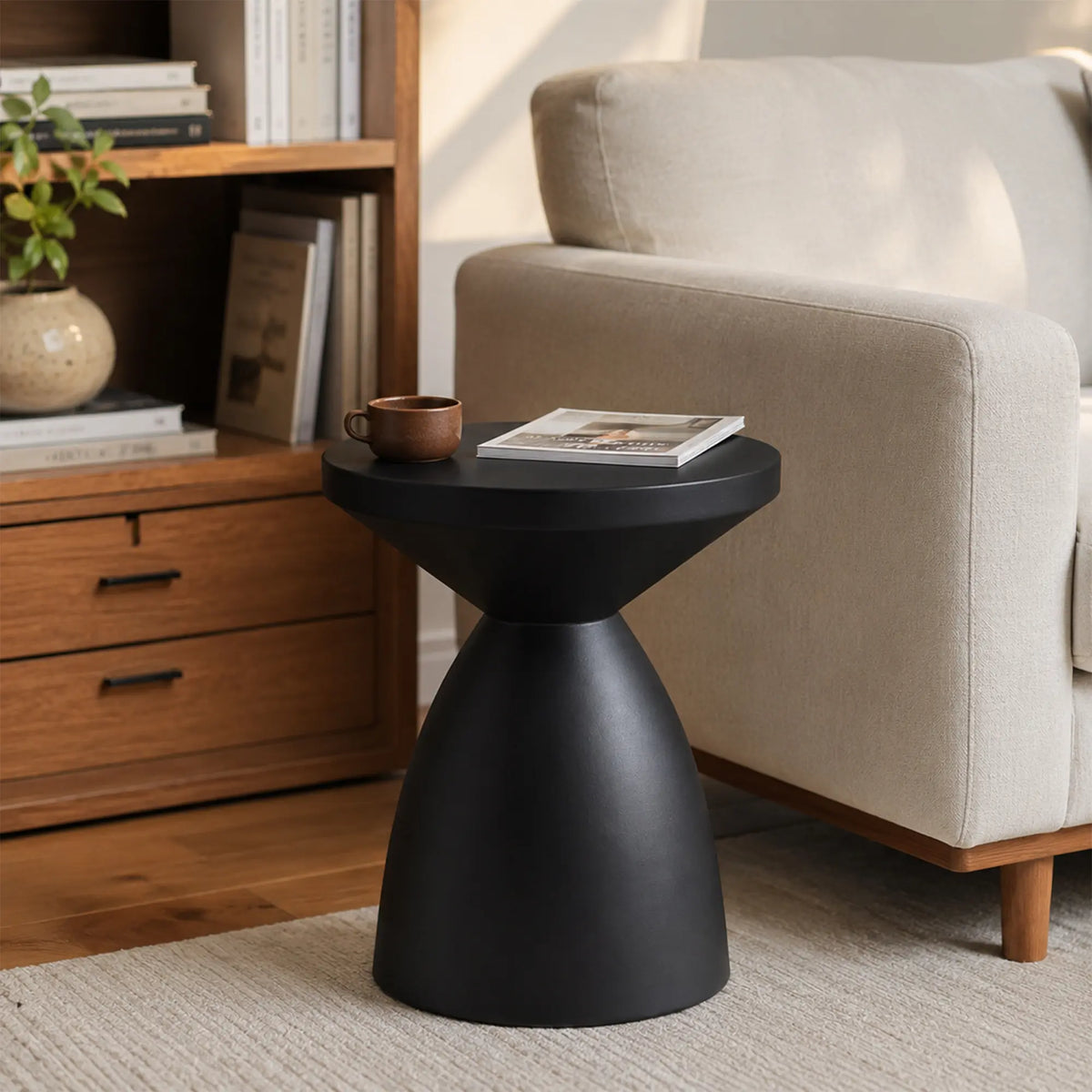 LIVARA Hourglass Round Side Table with Sculptural Pedestal Design, Durable Magnesium Cement & Speckled Finish, Modern Accent Table for Living Room - Black