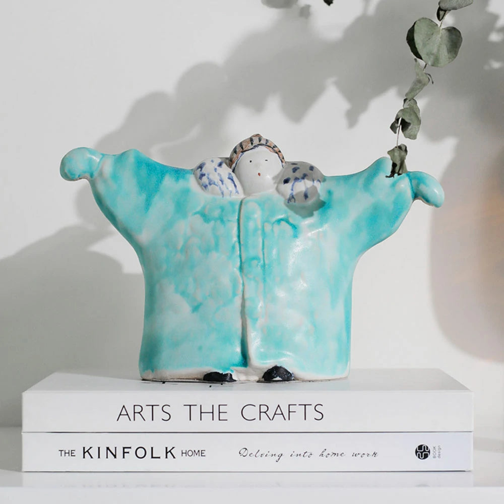 LIVARA Embrace Ceramic Figurine - Sculptural Hugging Design with Handcrafted Artistic Finish, Heartwarming Accent Decor for Modern Homes - Light Blue