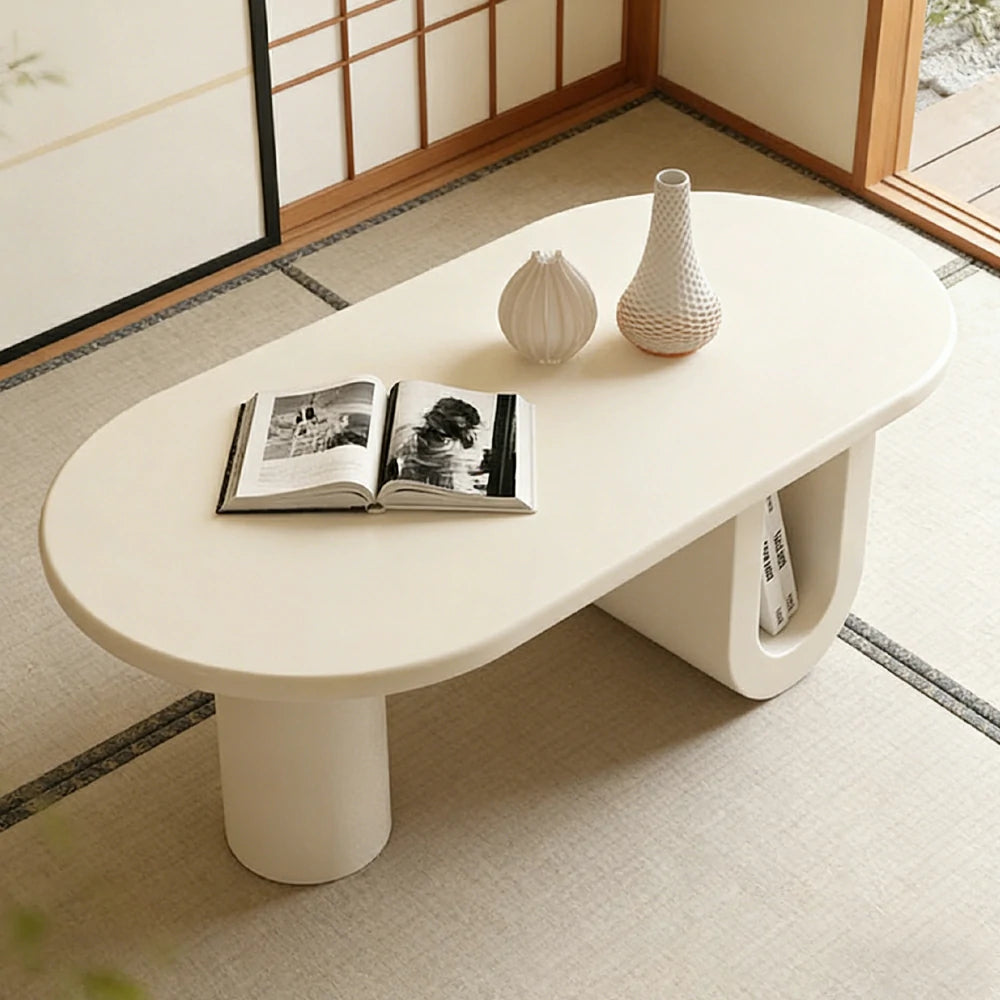 LIVARA Modern Coffee Table - Space-Saving Oval Design, Sculptural U-Base with Open Storage, Smooth Rounded Edges, Small Apartment Friendly - Cream White